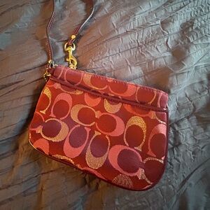 Coach wristlet with front pocket